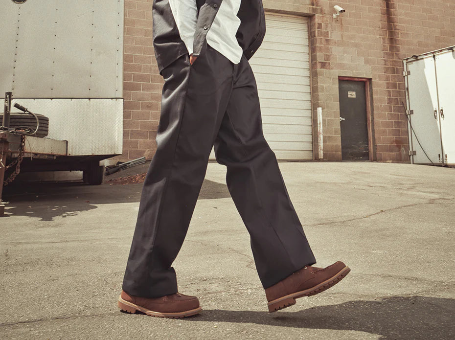 Industrial workwear in motion at a loading dock